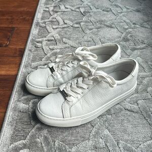 J Slides women’s white leather sneaker